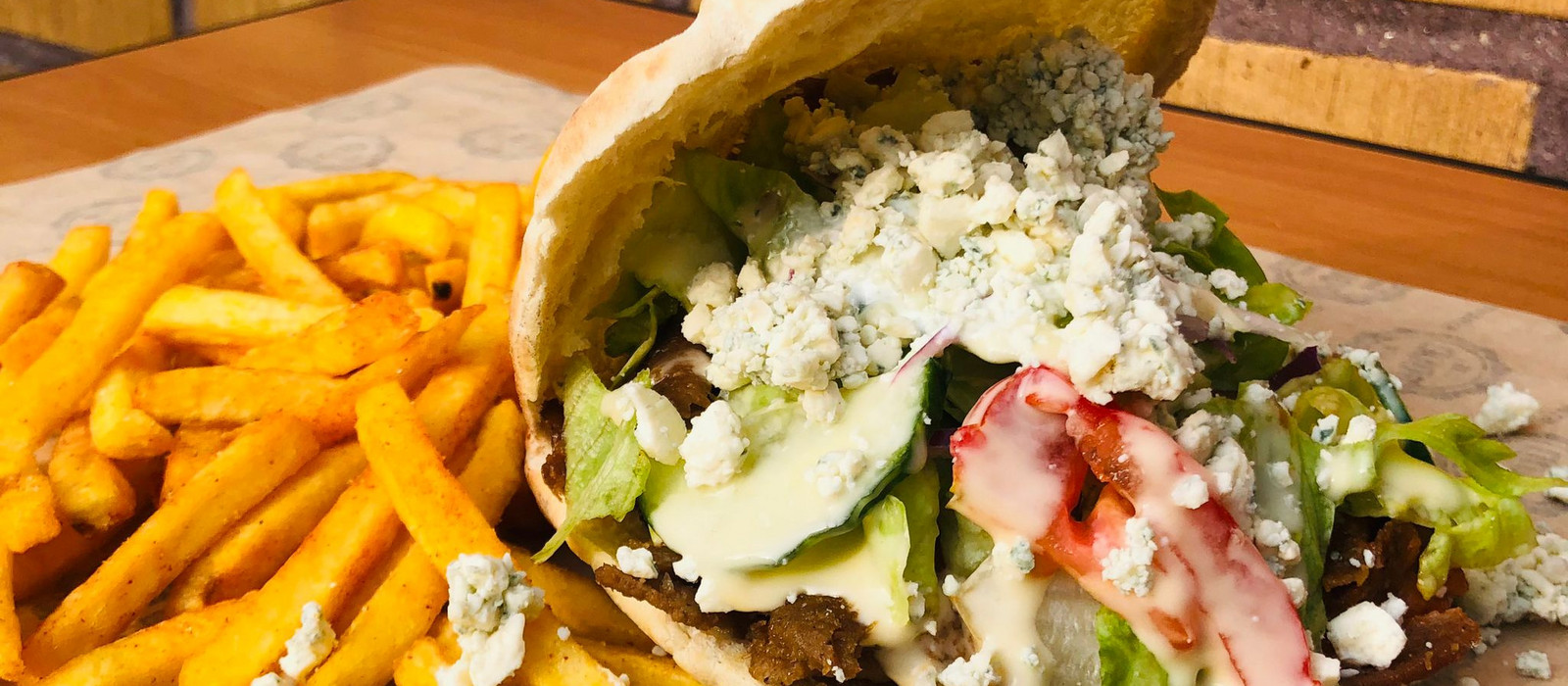 Loaded kebab plate with fries from Danian Kebubbi